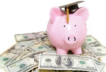 Piggy bank with graduation cap