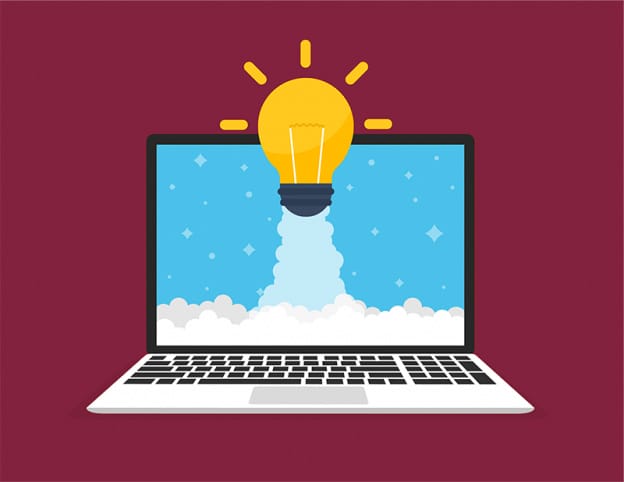 laptop computer with lightbulb taking off like a spaceship representing software training